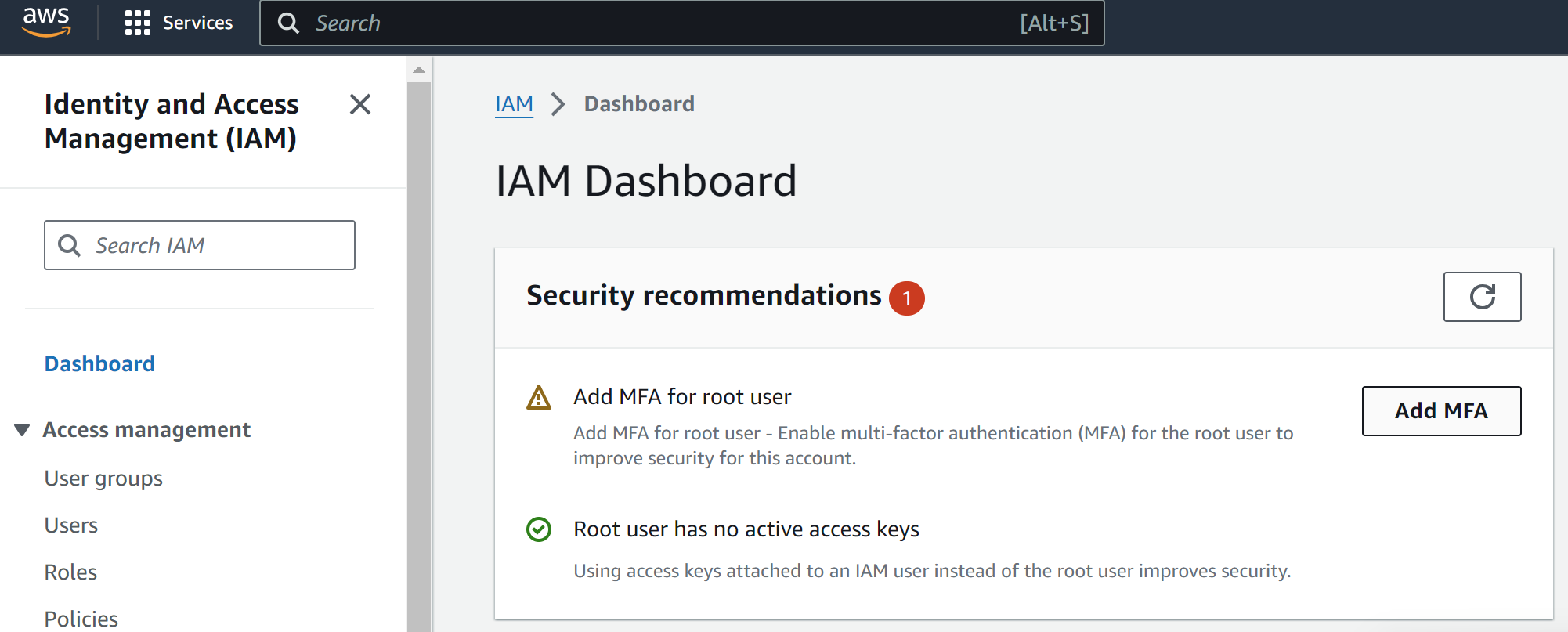 Screenshot of AWS IAM Dashboard displaying security recommendations, including a prompt to ‘Add MFA for root user’ and a note on the absence of active access keys for the root user, with navigation options for user groups, users, roles, and policies